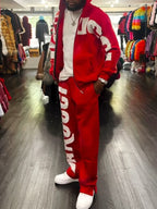 Bold Red Tracksuit With Large White Logo Lettering